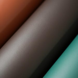 Close up view of top grain premium Italian leather, 4.5-5 oz, brown leather ideal for crafting projects like bags, wallets, and accessories.