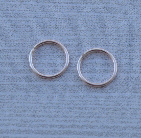 nose piercing with gold wire