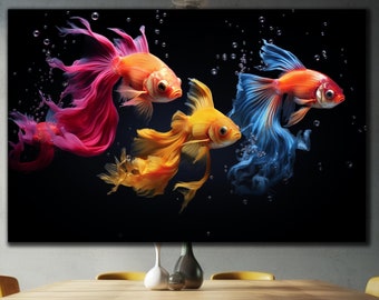 May include: A black canvas print featuring three colorful fish swimming in a dark blue water setting. The fish are red, orange, and blue with flowing fins.