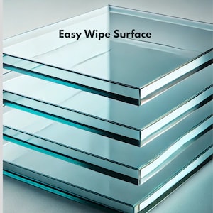 May include: Four pieces of 4 mm tempered glass stacked on top of each other. The glass is clear and has a smooth, easy-to-wipe surface. The text "Easy Wipe Surface" is printed on the top piece of glass. The text "Superior Quality Appearance with Advanced Printing Technology" is printed below the glass.