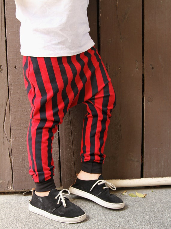 red and black vertical striped pants