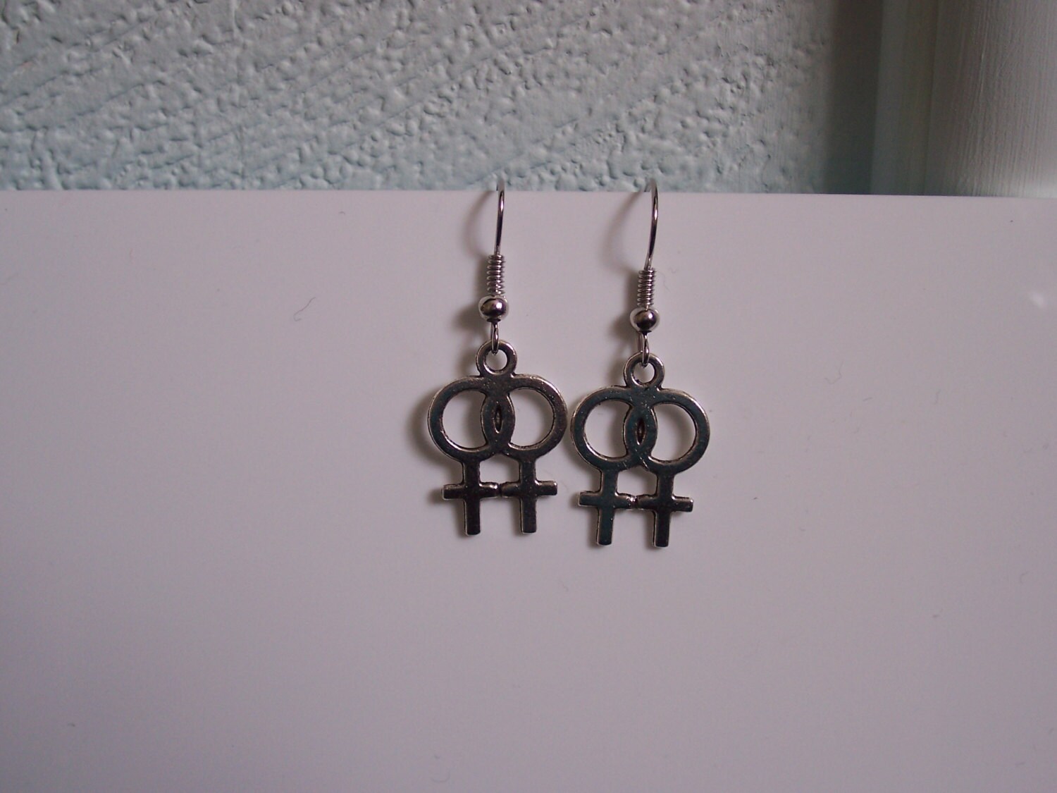 Double venus earrings sale