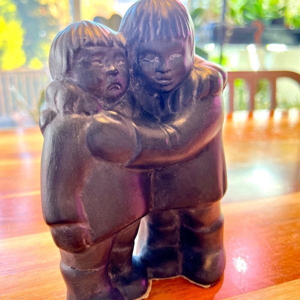 Inuit boys Boma Canada/ Vintage figurine made of black resin made in British Columbia Canada