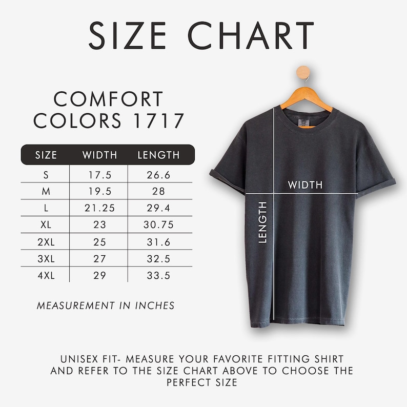 Peut inclure: Un tableau des tailles pour les t-shirts Comfort Colors 1717. Le tableau affiche les mesures en pouces (converties en cm) pour les tailles S &agrave; 4XL, y compris la largeur et la longueur. Un t-shirt gris est suspendu &agrave; un cintre en bois.