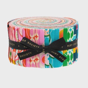 May include: A rolled bundle of colorful fabric strips, featuring pink, orange, teal, and green patterns. A black ribbon with the text "RUBY STAR SOCIETY" wraps around the fabric. The fabric is suitable for quilting and crafting projects.