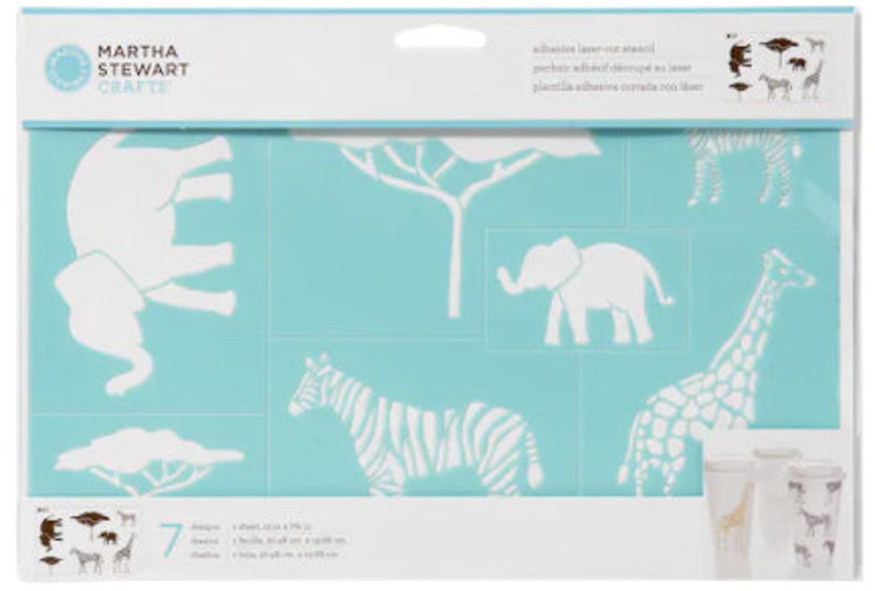 May include: A blue and white stencil sheet with 7 different safari animal designs, including an elephant, zebra, giraffe, and trees. The stencil is made of plastic and is adhesive backed. The sheet is packaged in a clear plastic sleeve with the Martha Stewart Crafts logo.