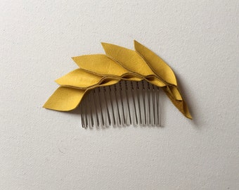 I Yellow leather petal hair comb