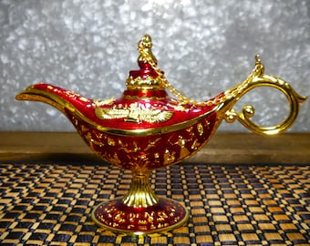 Egyptian Velvet Red and Gold Vintage Souvenir Genie Lamp with Embossed Hieroglyphic and Goddess Motif