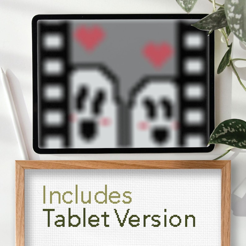 May include: A digital illustration of two ghosts with hearts above them, displayed on a tablet screen. The text "Includes Tablet Version" is displayed below the image.