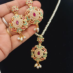 punjabi jadau Ayeza pendent set in semi precious pearls and stones.  Indian jadau jewellery