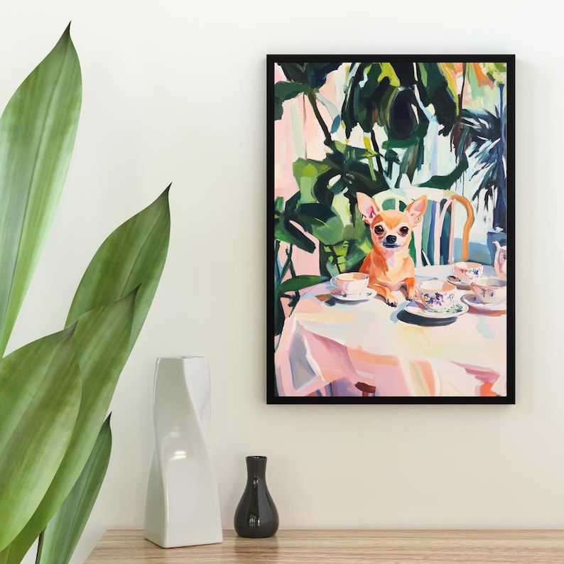 May include: A painting of a chihuahua sitting at a table with teacups and a teapot. The chihuahua is brown and white and has a pink nose. The table is covered in a pink tablecloth and there are green plants in the background.