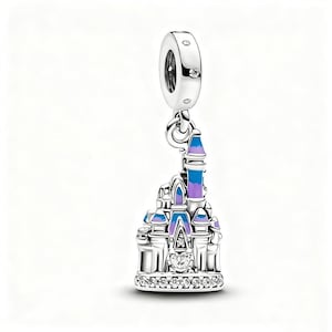 May include: A silver charm with a castle design, featuring blue and purple detailing. The charm depicts a detailed castle structure, with a sparkling base and a loop for attaching to a bracelet or necklace. It hangs from a silver loop with a small gem.