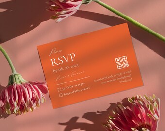 May include: Orange RSVP card with white text. The text reads "Please RSVP by 08. 20. 2025" and includes a line for a name and a QR code. Below the QR code is the text "Scan the QR code to reply or send your response through mail. Thank you!" There are two checkboxes with the text "Joyfully accepts" and "Regretfully denies".