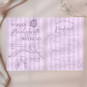 May include: Two-page lavender striped invitation for a bachelorette weekend. The left page reads "Maria's Bachelorette Weekend" with event details. The right page lists weekend activities, including yoga, massages, and dinner.