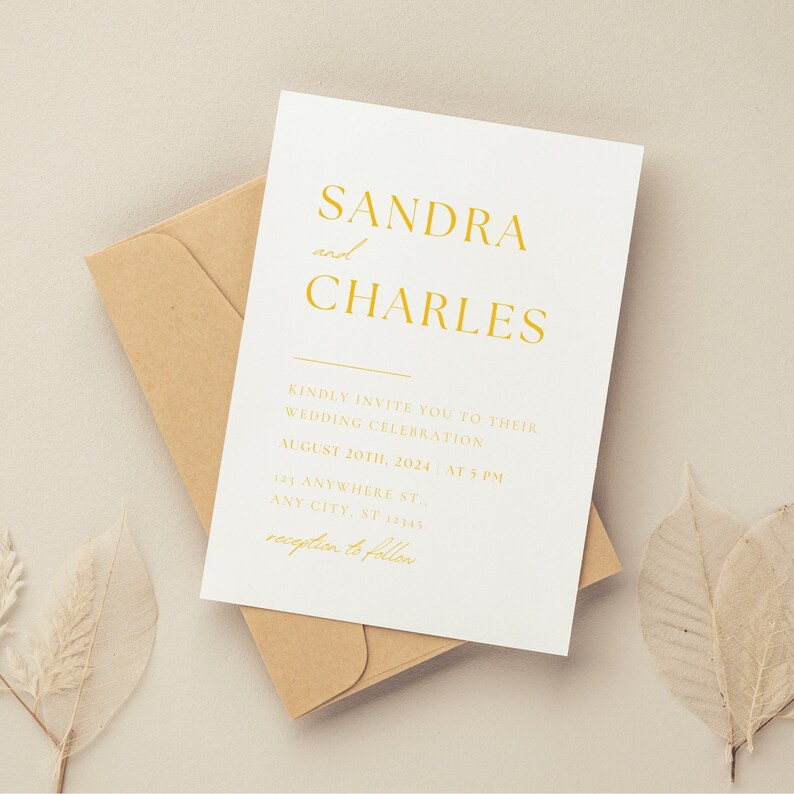 May include: A white wedding invitation with gold text. The invitation reads "Sandra and Charles kindly invite you to their wedding celebration August 20th, 2024 at 5 PM 123 Anywhere St. Any City, ST 12345 reception to follow."