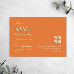 May include: An orange RSVP card with a white border and white text. The text reads "Please RSVP by 08. 20. 2025 Name / Surname" and includes two checkboxes: "Joyfully accepts" and "Regretfully denies". A QR code is included with the text "Scan the QR code to reply or send your response through mail. Thank you!"