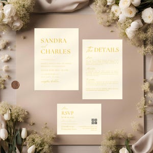 May include: Wedding invitation suite with a cream background and gold foil lettering. The invitation features the names "Sandra and Charles" and details of their wedding celebration. The RSVP card includes a QR code.
