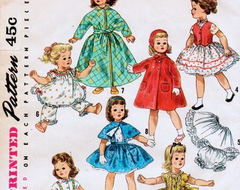 May include: A vintage Simplicity sewing pattern for a doll, featuring a variety of outfits including a dress, a coat, and a skirt. The pattern is printed on a white background with black text and illustrations. The pattern number is 1779 and the price is 45 cents. The text "Simple to make" is printed in a pink box.