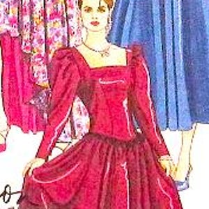 May include: A burgundy-colored formal gown with a square neckline and long sleeves. The dress features a fitted bodice, a full skirt, and decorative trim. The design includes a high waistline and a classic, elegant silhouette.