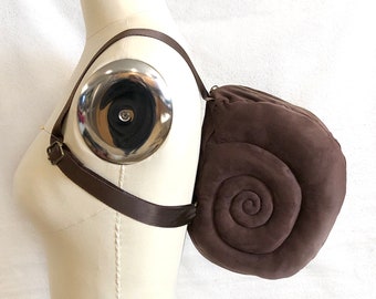 Small Brown Snail Shell Backpack in dark brown faux suede