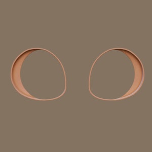 Peut inclure: Deux cerceaux ovales de couleur marron, chacun avec une ouverture circulaire au centre. Les cerceaux sont placés côte à côte sur un fond marron.