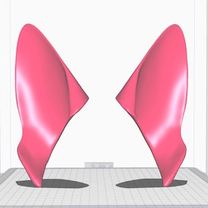 May include: A pair of pink 3D printed cat ears. The ears are designed to be worn as a costume accessory.