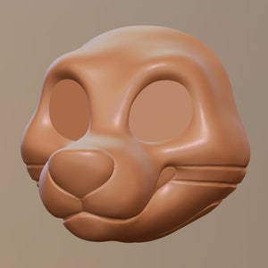 Op de afbeelding: Een 3D-geprint, lichtbruin, dierenmasker met gaten voor ogen en een gedetailleerde neus en mond.