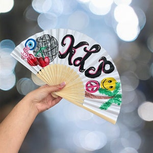 Abanico de papel para rave con temática ibicenca