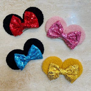 Disney Mickey / Minnie Mouse ears Hair Clips. Mouse ears. Hair clips. Barrettes. lightweight. smaller size.