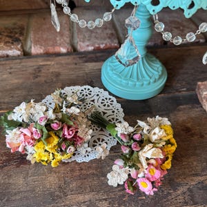 May include: A set of three ceramic mugs with a speckled, matte finish. Each mug features a different color: light blue, cream, and gray. The mugs have a simple, modern design and a comfortable handle.