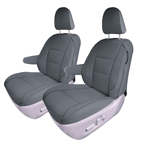 May include: Two gray leather car seat covers with headrests. The covers have a quilted design and are made of a durable material.