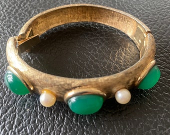 Vintage Joseph Mazer 1959 "Maharanee" Green Glass  and Pearl Bangle Bracelet. Excellent condition. Fits best 6”-7” wrist.