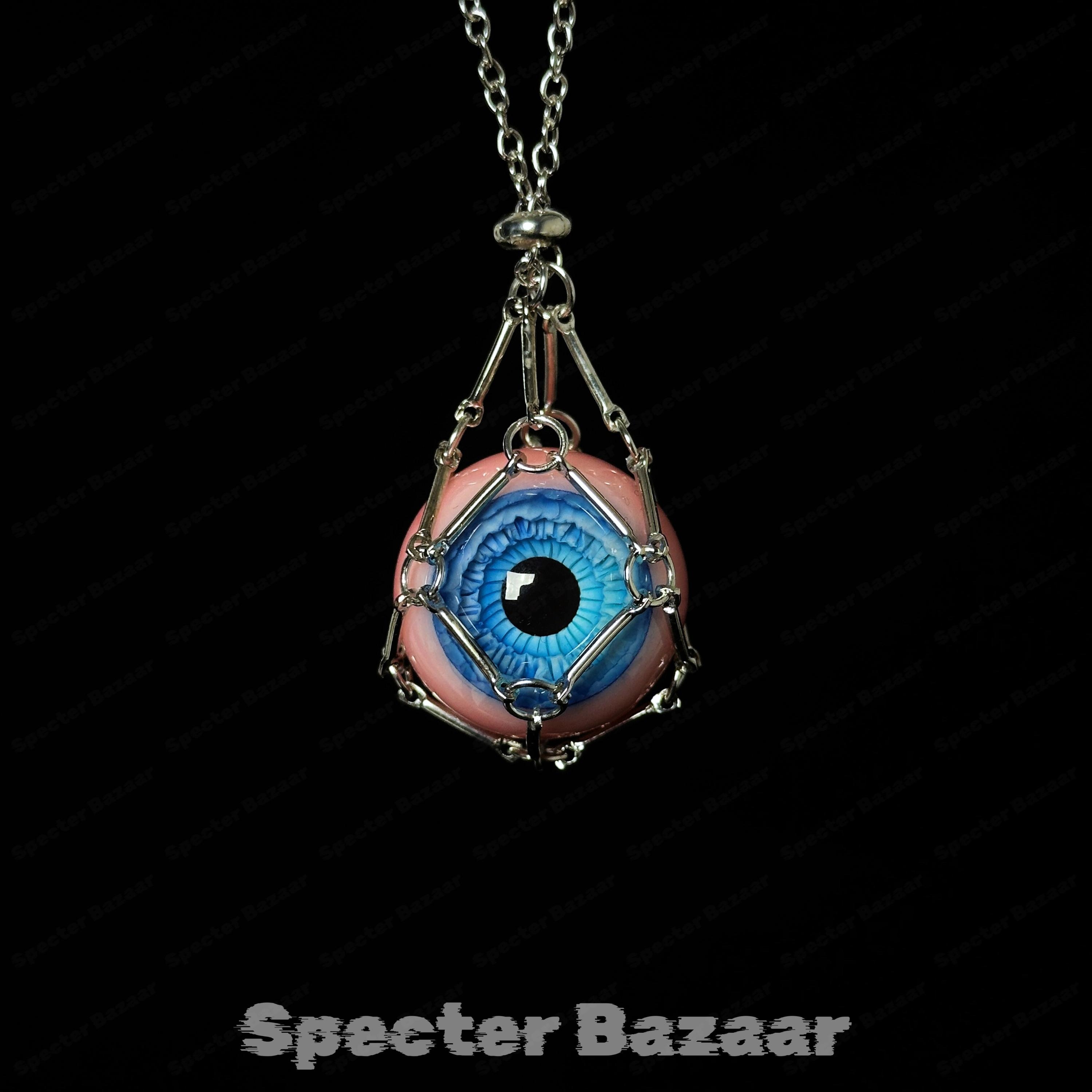 Realistic Eyeball Necklace in Cage – Gothic Oddity Resin Eye