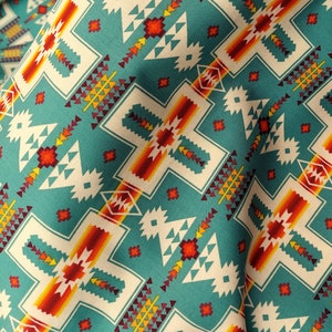Elizabeth&#39;s Studio Tucson Native Cross: 468 Turquoise Cotton Fabric