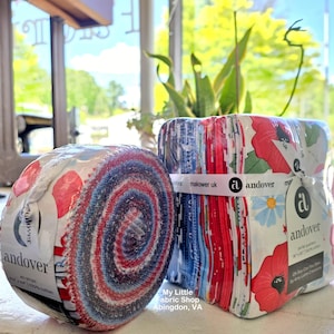 May include: Two fabric bundles. One is a roll of red, white, and blue fabric. The other is a stack of fabric squares with floral patterns. Both are labeled "andover" and "makower uk". The shop name "My Little Fabric Shop Abingdon, VA" is also visible.
