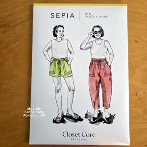 May include: A sewing pattern package titled "SEPIA" featuring illustrations of two figures wearing pants and shorts. The package includes the text "No. 41 PANTS + SHORT" and the brand name "Closet Core PATTERNS". The package also includes the text "My Little Fabric Shop Abingdon, VA".