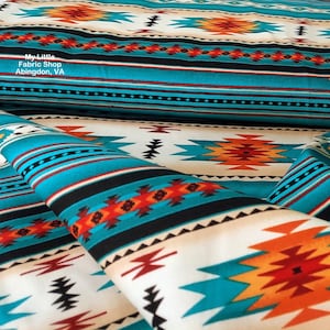 Couverture Tucson à rayures Elizabeth&#39;s Studio : tissu en coton turquoise 201