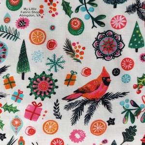 May include: White fabric featuring a festive Christmas pattern. The design includes a red cardinal, Christmas trees, snowflakes, gifts, and floral elements in red, green, orange, and pink.
