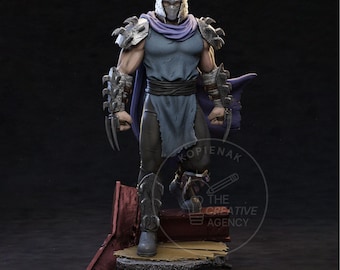 May include: A detailed figurine of Shredder, a character from Teenage Mutant Ninja Turtles. The figure is in a dynamic pose, wearing a silver helmet, armor, and a purple cape. The figure stands on a textured base with a dark background.