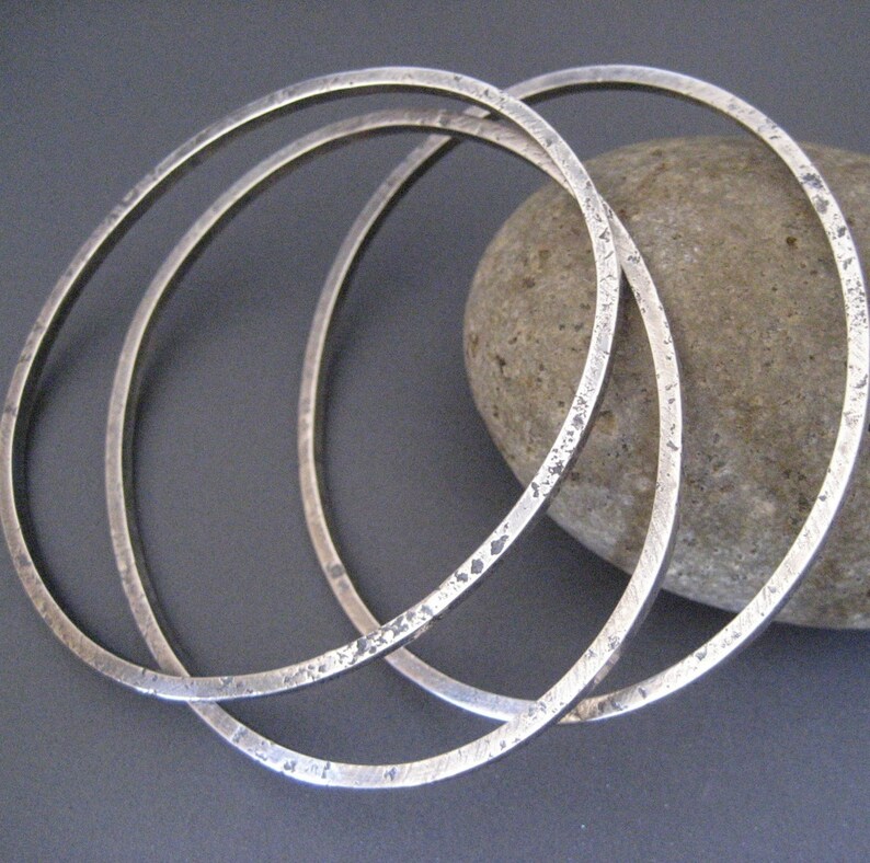 Three Organic Sterling Silver Bangles