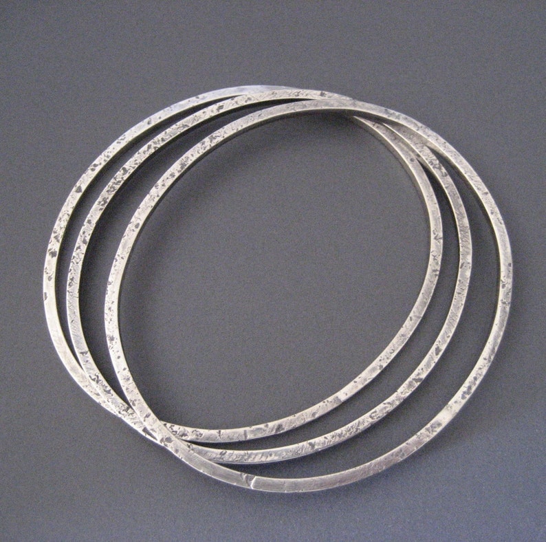 Three Organic Sterling Silver Bangles