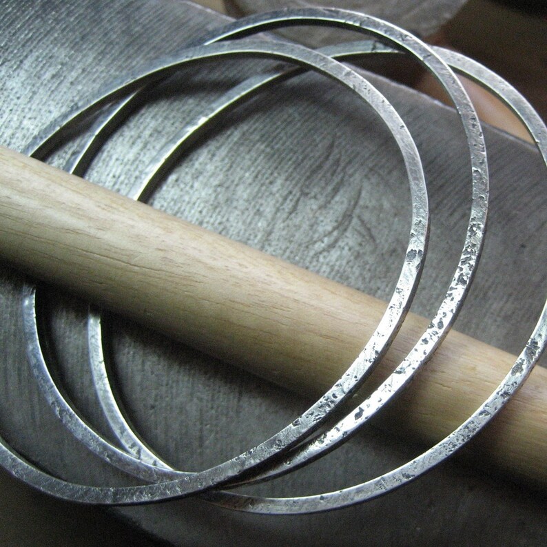 Three Organic Sterling Silver Bangles