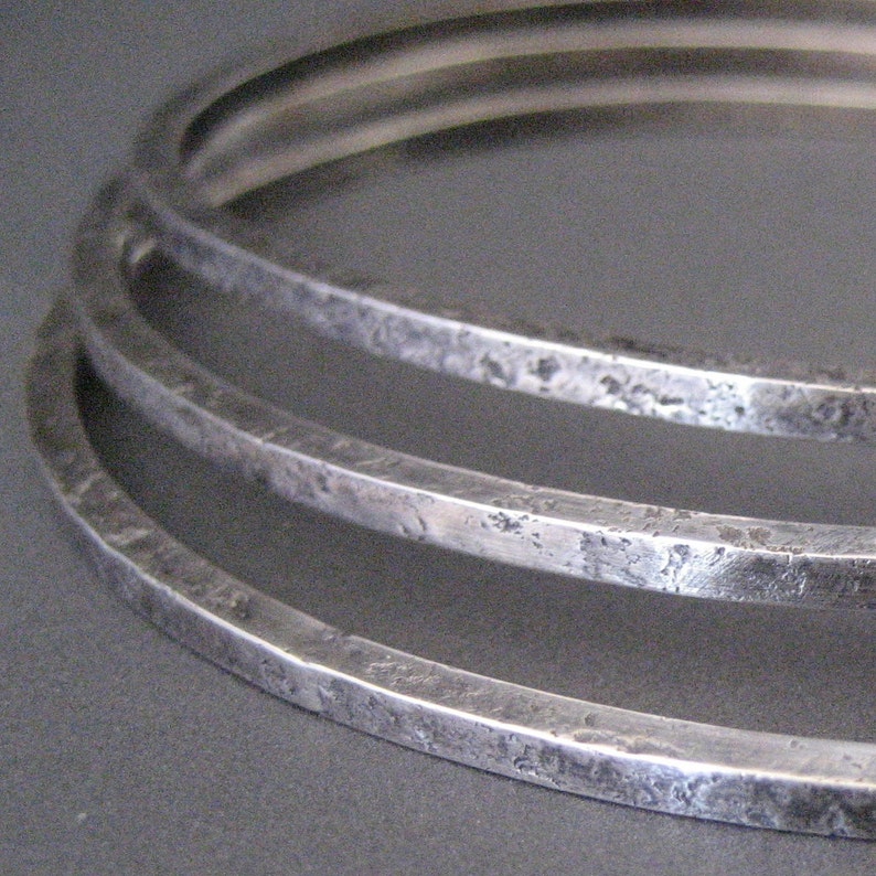 Three Organic Sterling Silver Bangles