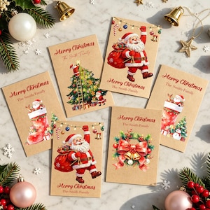 May include: A collection of six rectangular greeting cards on a marble surface, each featuring the text Merry Christmas and The Smith Family. The designs include Santa Claus with a gift sack, a decorated Christmas tree, a stocking, and a festive wreath.
