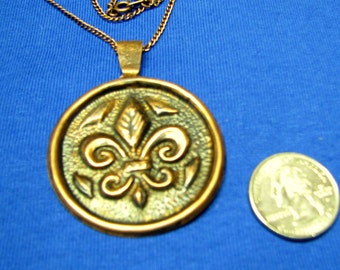 Fleur de lis copper repousse' pendant