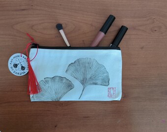 Handmade linocut print pouch/case featuring a Japanese ginkgo leaf design with tassel.
