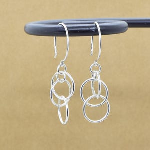 Sterling Silver Dangle Earrings: Interlocking Circle Drop Earrings