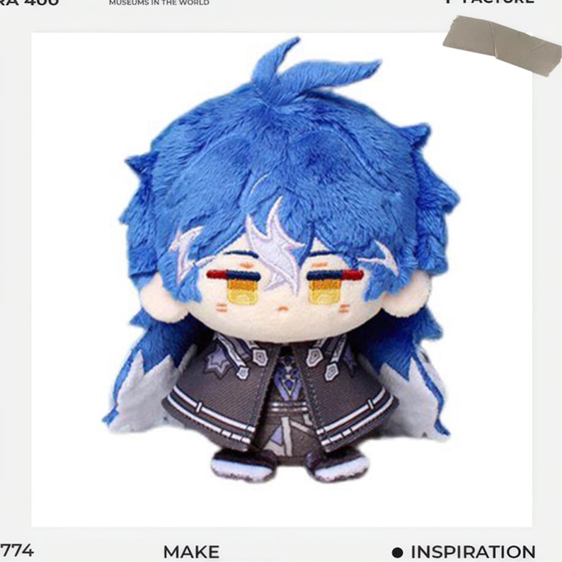 May include: A plush doll with blue hair and a detailed outfit. The doll has a white face with yellow eyes and a black and gray coat. The image includes the words "MAKE" and "INSPIRATION".
