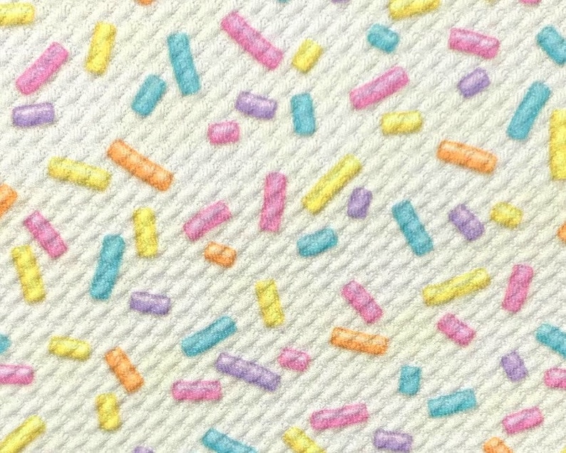 Textured Bullet Liverpool DBP Ribbed Knit Polyester Blend Stretch Printed Fabric By The Yard 1y Sprinkles Off-Wht