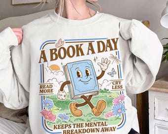 Camiseta "Un libro al día mantiene alejado el colapso mental", Camiseta para amantes de la lectura y la salud mental, Lindo diseño de lectura, Regalo para amantes de los libros